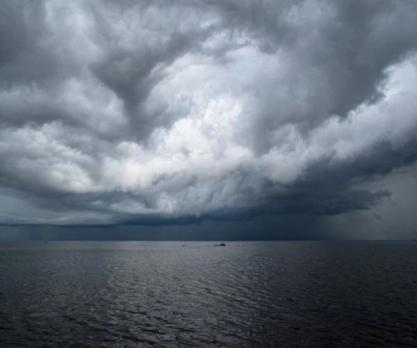 You Notice a Buildup Of Dark Clouds and Shifting Winds. What is Likely?
