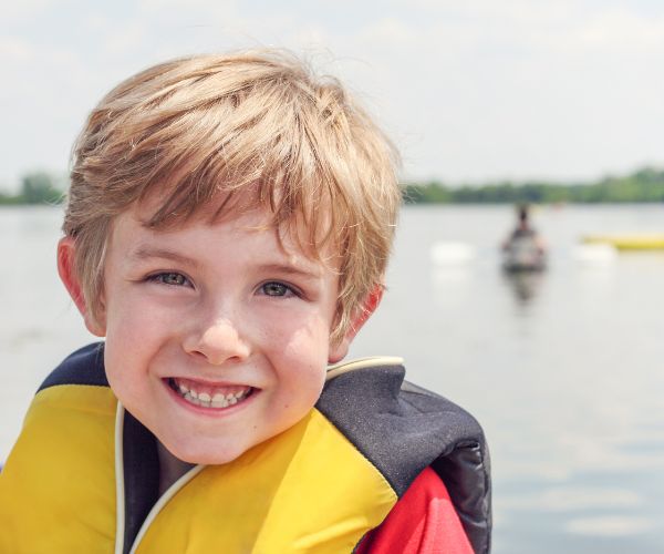 Which type of PFD will turn most unconscious people face up in the water?